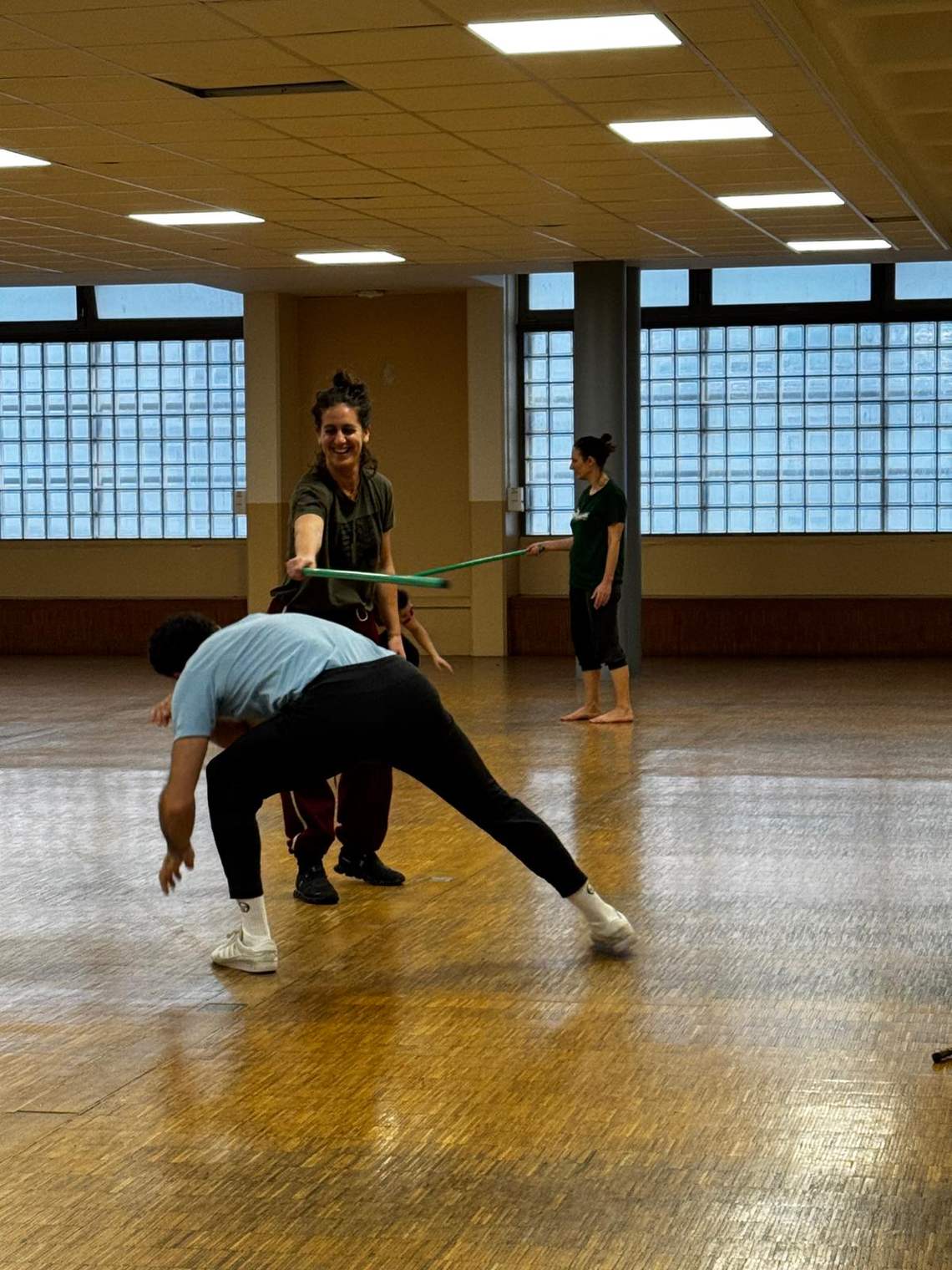 Jeu de capoeira entre adultes, fin de séance